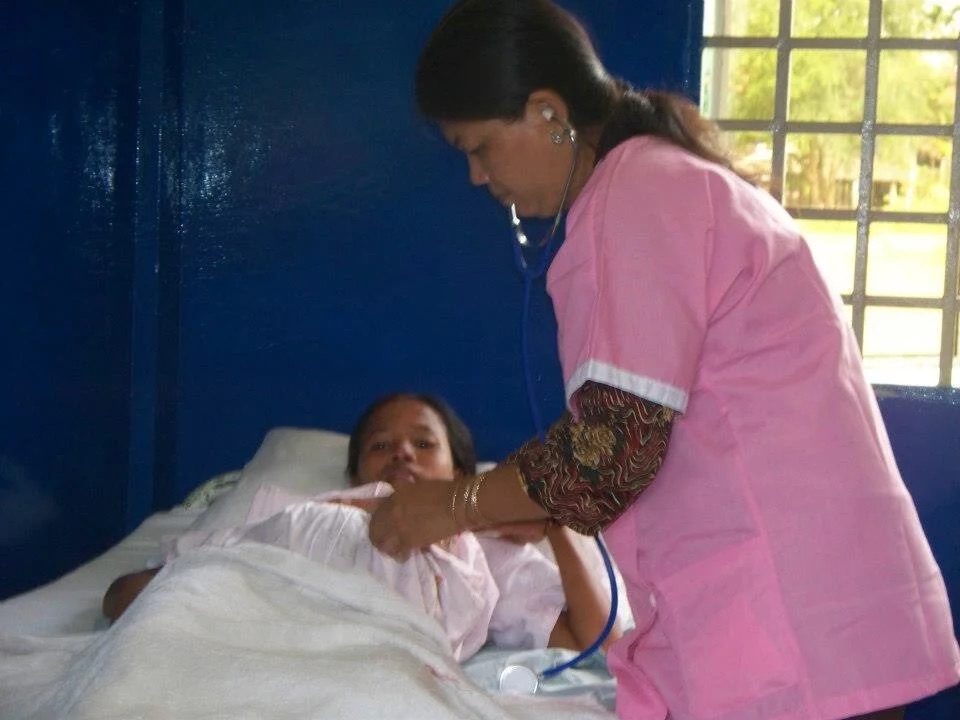Patients waiting inside the clinic.